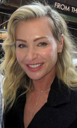 Portia De Rossi Smiling Close Up Wallpaper