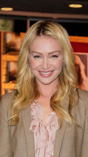 Portia De Rossi Smiling Event Appearance Wallpaper