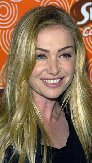 Portia De Rossi Smiling Event Portrait Wallpaper