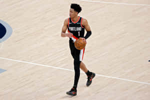 Portland Basketball Player Dribbling Wallpaper