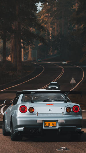 Powerful Elegance In Motion: The R32 Gtr Car Wallpaper