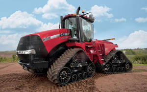 Powerful Red Case Stx Steiger Tractor In A Field Wallpaper