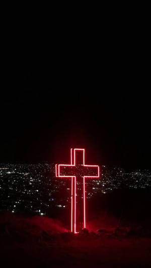 Praising Jesus With A Pink Cross Wallpaper