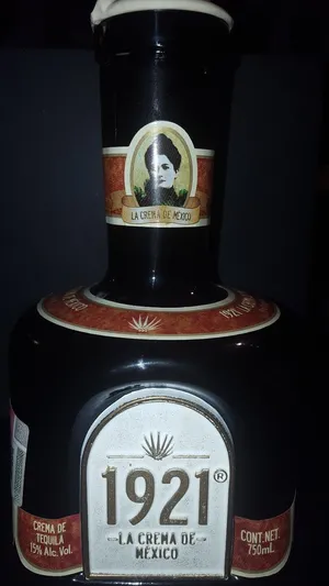 Premium 1921 Tequila In A Sophisticated Setting Wallpaper