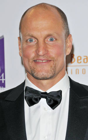 Primetime Emmy Award Winner Woody Harrelson Smiling At The Camera Wallpaper