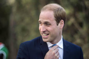 Prince William Fixing His Tie Wallpaper