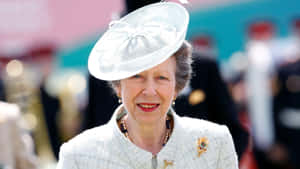 Princess Anne Adorned In Graceful All-white Outfit Wallpaper