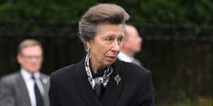 Princess Anne Looking Somber In Mourning Wallpaper