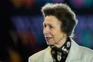 Princess Anne Wearing Beige Jacket With Scarf Wallpaper