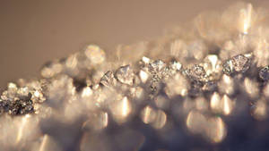 Pristine Pile Of Glittering Diamonds Wallpaper