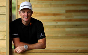 Pro Golfer Justin Rose Flashing A Winning Smile Wallpaper