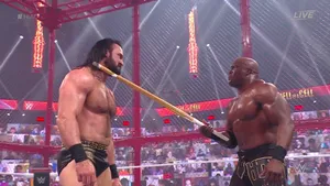 Pro Wrestler Bobby Lashley Challenging Drew Mcintyre Wallpaper