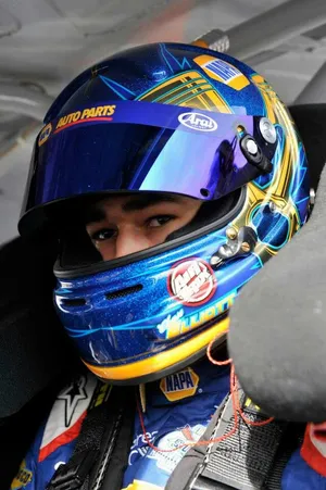 Professional Nascar Driver Chase Elliott In Action Wallpaper