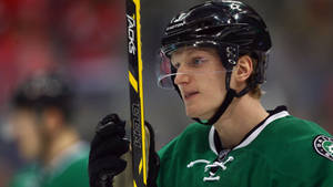 Professional Nhl Player John Klingberg In Action Wallpaper