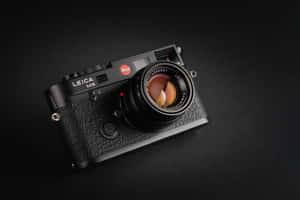 Professional Photography With Black Leica M6 Camera Wallpaper