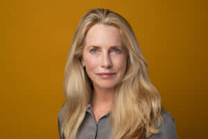 Professional Portrait Against Yellow Background Wallpaper