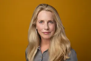 Professional Portrait Against Yellow Background Wallpaper
