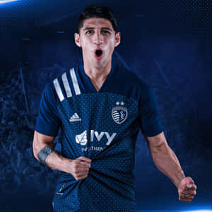 Professional Soccer Player Alan Pulido In Action Wallpaper