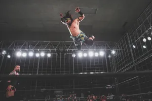 Professional Wrestler Heavyweight Jacob Fatu Frog Splash Wallpaper