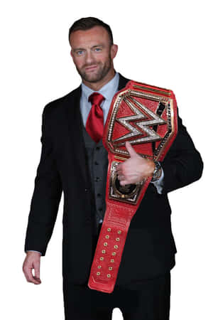 Professional Wrestler With Championship Belt Wallpaper