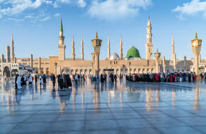 Prophet's Mosque In Saudi Arabia - Illuminated At Night Wallpaper