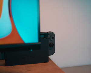 Psp Joystick On A Table Wallpaper