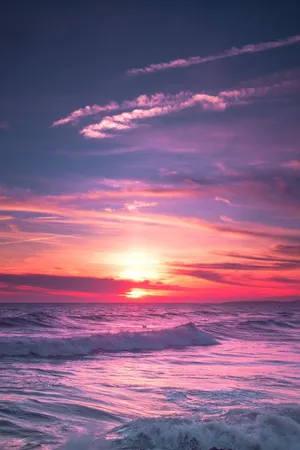 Purple Aesthetic Sunset Sky Over Ocean Waves Wallpaper
