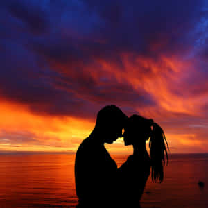 Purple Red Sunset Couple Wallpaper