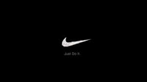 Put Your Performance To The Test In Black Nike Wallpaper