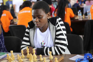 Queen Of Katwe Uganda Playing Chess Wallpaper