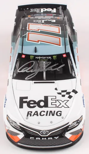 Race Car With Denny Hamlin Signature Wallpaper