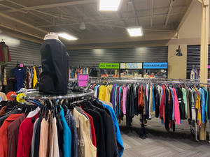 Racks Of Thrifty Clothes Wallpaper