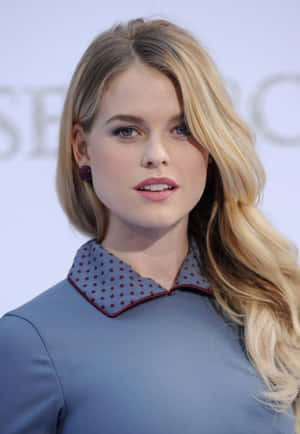 Radiant Alice Eve Posing For A Photoshoot Wallpaper