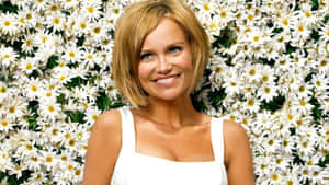 Radiant Kristin Chenoweth Smiling In A Photoshoot Wallpaper