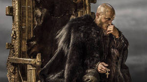 Ragnar From Vikings On A Throne Wallpaper