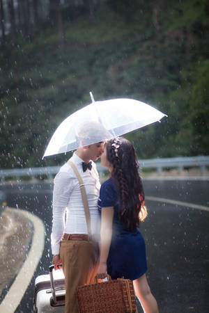 Rain Couple On The Street Wallpaper