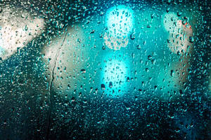 Raindrops On A Desktop Computer Screen Wallpaper