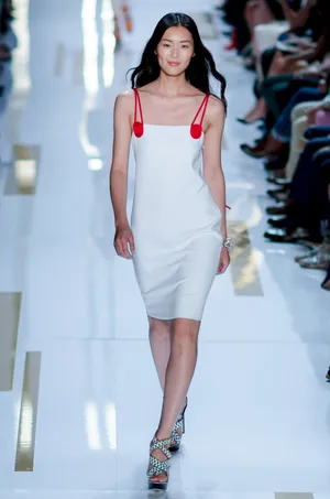Ralph Lauren Corporation Smiling White Dress Wallpaper