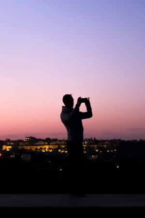 Random Person Photographing Lovely Sunset Wallpaper