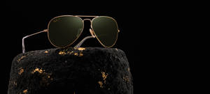 Ray-ban On A Rock Wallpaper