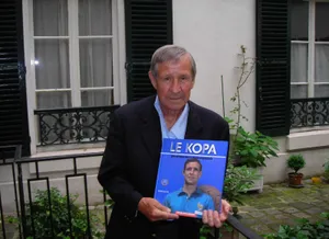Raymond Kopa Holding Autobiography Wallpaper