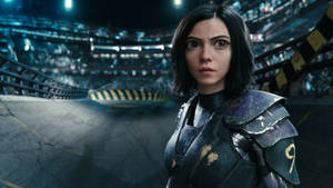 Ready For Battle, Alita Takes The Fight To The Streets In Her Advanced Armor Wallpaper