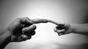 Real Hands Depiction Of Michelangelo The Creation Wallpaper