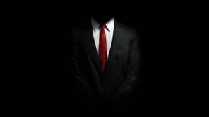 Real Hitman Engaged In A Critical Mission Wallpaper