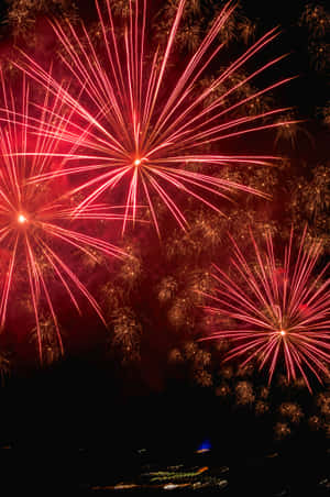 Red And Orange Fireworks Display Wallpaper