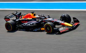 Red Bull Racing Car In Full Speed Wallpaper