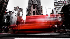 Red Flare In Front Of Madison Square Park Wallpaper