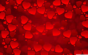 Red Hearts On A Red Background Wallpaper