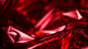 Red Holographic Paper Background Wallpaper