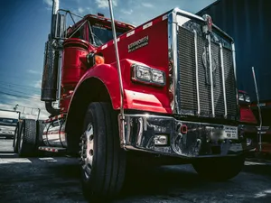 Red Kenworth Truck At Road Wallpaper